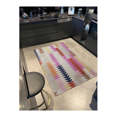 Tapis beige géométrique multicolore à rayures géométriques