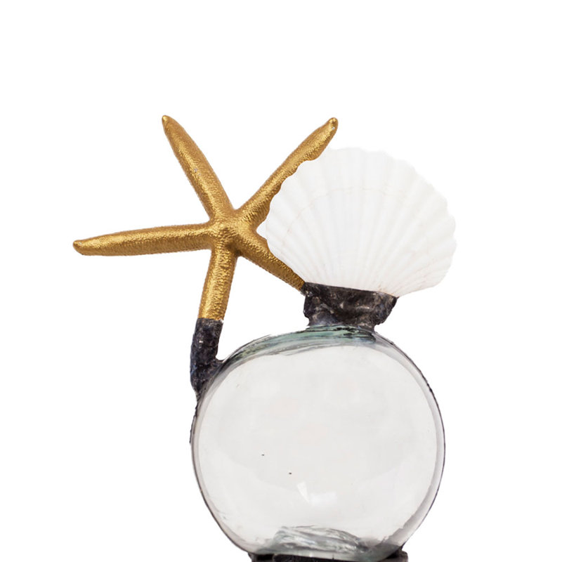 Petite sculpture étoile de mer avec coquille flottante