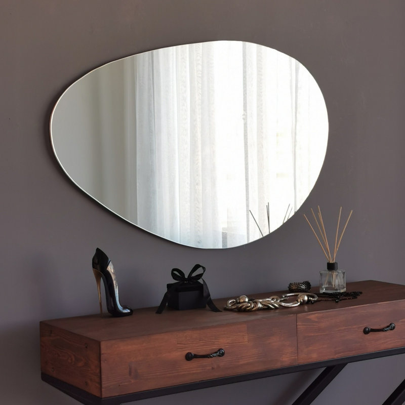 Élégant miroir mural abstrait, finition blanche, 35,4 x 23,6 x 0,5 pouces | Matériau 100% bois aggloméré, fixation murale | Parfait pour la décoration intérieure moderne, rehausse la lumière et l'espace, design élégant et fonctionnel