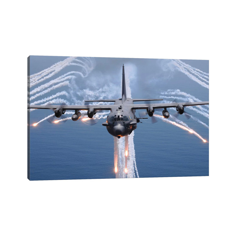 An AC-130H Gunship Aircraft Jettisons Flares As An Infrared Countermeasure by Stocktrek Images - Wrapped Canvas Print