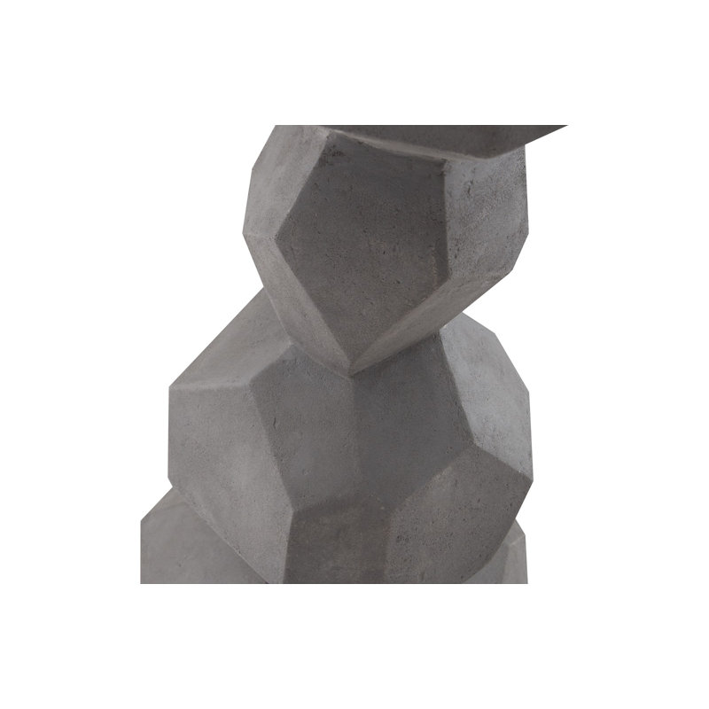 Sculpture colonne de roche à facettes