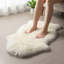 Tapis à poils longs ivoire Burgett-2114017985
