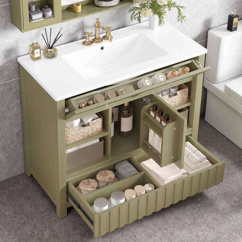Meuble-lavabo 36 po - coin rabattable, 7 tablettes ouvertes et tiroir à ouverture par pression. Structure en bois massif, plateforme de robinet 4 po, étoile de rangement compacte