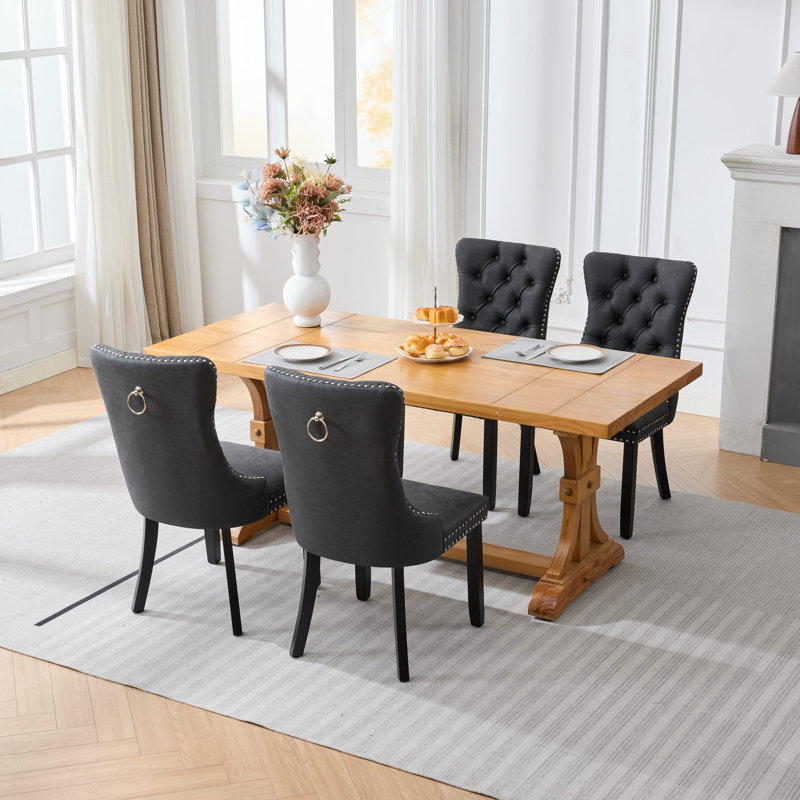 Ensemble de 4 chaises de salle à manger, style vintage, en similicuir imitation peau de mouton, dossier haut, capitonnage à boutons et clous décoratifs, coussin à ressorts ensachés et structure en bois.