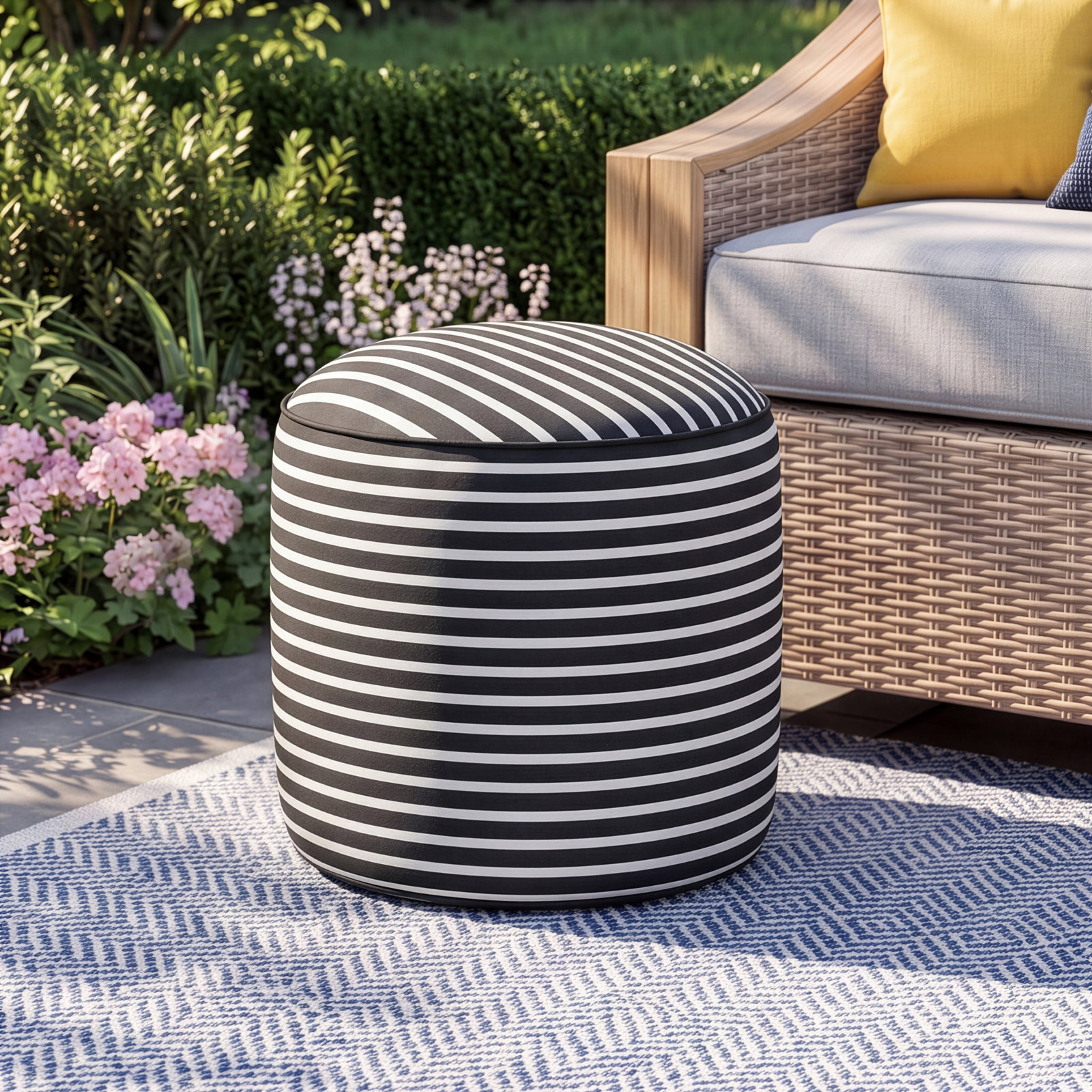 Moseley Round Upholstered Outdoor Ottoman with Sunbrella® Cushion, Shore Classic Black Stripe Sunbrella®