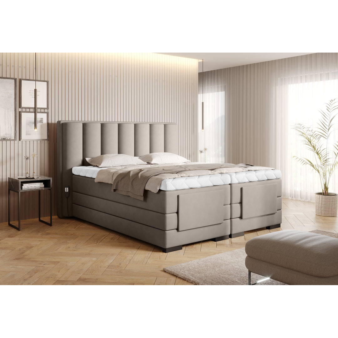 Elektrisch verstellbares Boxspringbett Arrigo mit Topper