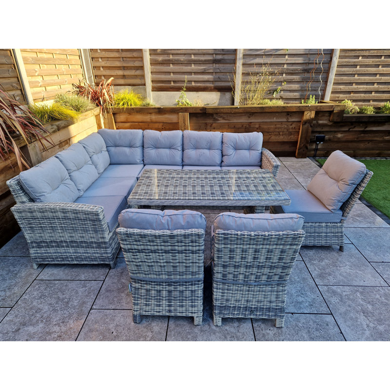 Angulay 9 - Person Patio Dining Set Rectangular Table with Cushions Included