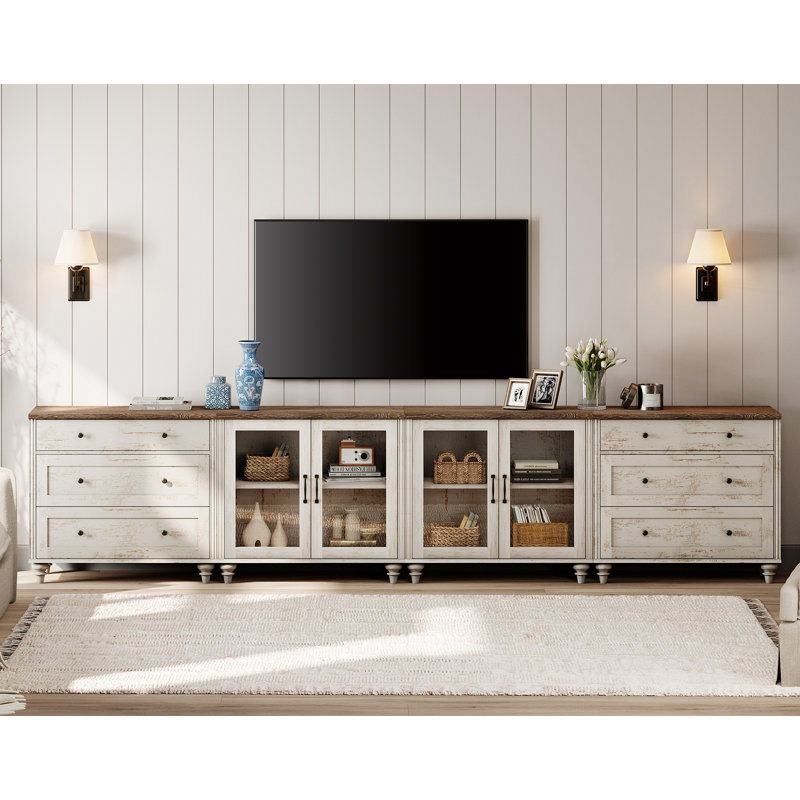 Scarlett 135.4" W Solid and Manufactured Wood TV Stand with Glass Doors and Solid Wood Legs, Rustic White