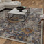 Tapis bleu abstrait en polypropylène tissé à la main Raashi-568561310