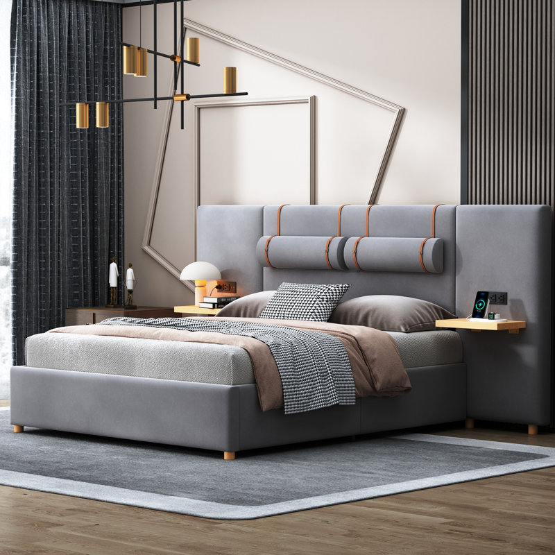 Grand lit tapissier en velours gris avec prise de courant