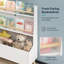 Meuble de rangement blanc multifonctionnel pour enfants, servant à de multiples usages : bibliothèque, présentoir à magazines et rangement pour jouets.