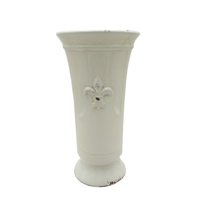 Vase romain à pieds