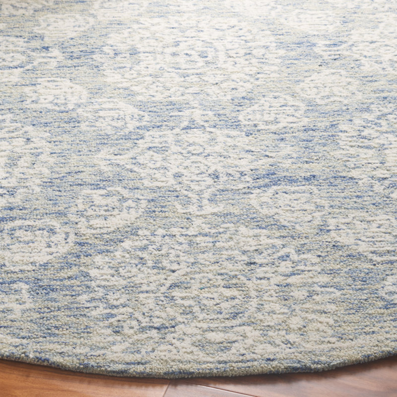 Rashea Ebony Hand Tufted Wool Cotton Floral Rug in Blue/Ivory, Round 6'