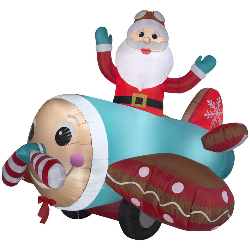 Avion animé en pain d'épice avec père Noël gonflable