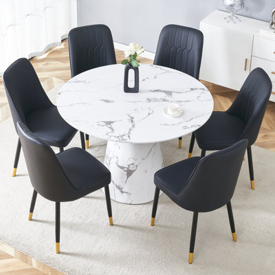 Nerita 4 - Person Pedestal Dining Set