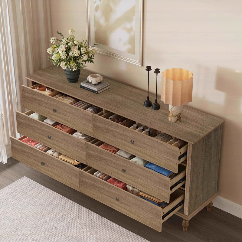 Commode à 6 tiroirs avec glissières à fermeture automatique, poignées en cuivre et métal pour un rangement sécuritaire et élégant