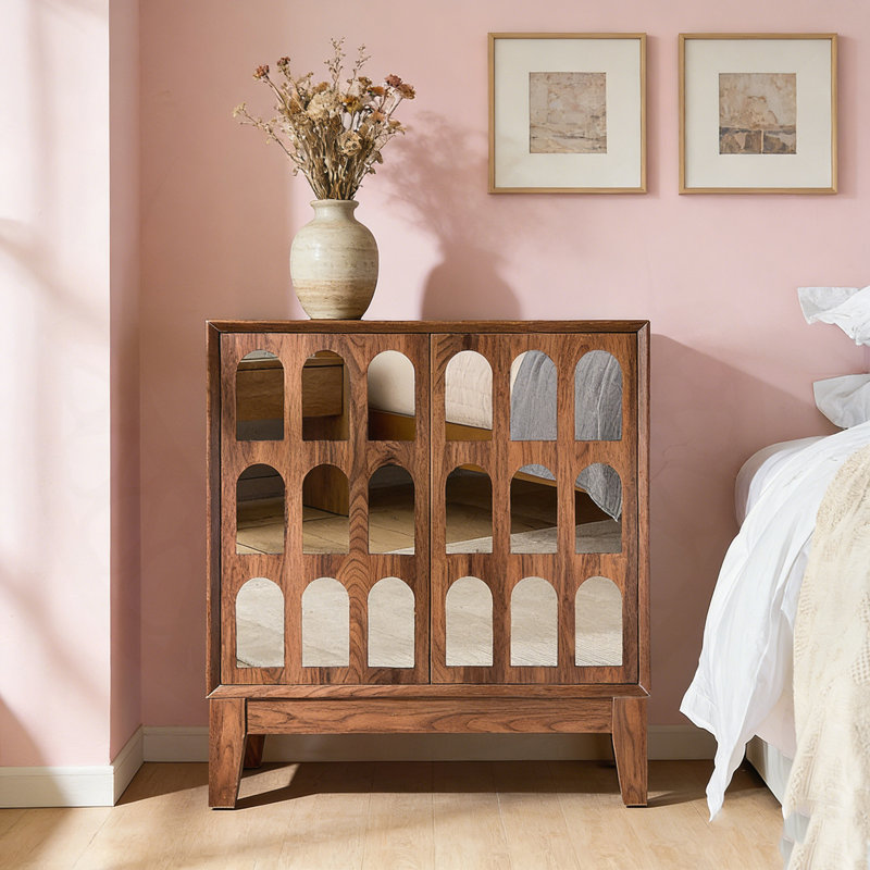 Armoire à double porte avec miroir, rangement spacieux et pieds en bois massif robustes pour les espaces de vie modernes.