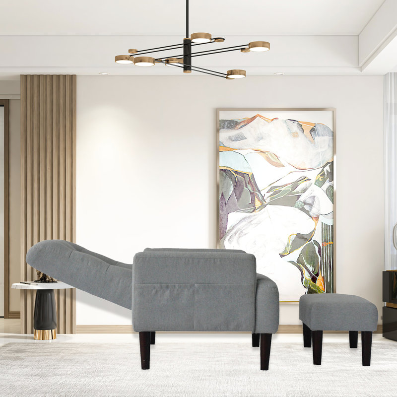 Fauteuil de salon avec plusieurs angles et rembourrage en mousse dans un tissu inclinable gris moderne