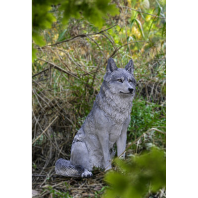 Statue de loup assis
