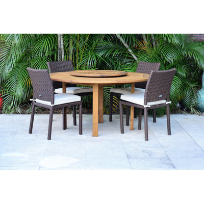 Anautica 4 - Person Wicker Patio Dining Set with Round Table , Cushions Included