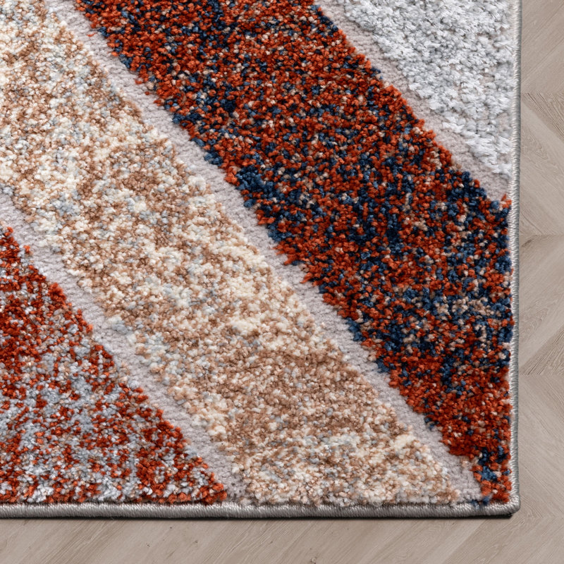Geometric Blue and Orange Synthetic Area Rug, 5'3" x 7'3"