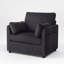 Fauteuil d'appoint surdimensionné en velours côtelé avec poches de rangement latérales, coussins décoratifs inclus, siège rembourré, dossier haut, accoudoirs arrondis, structure robuste, fauteuil simple moderne