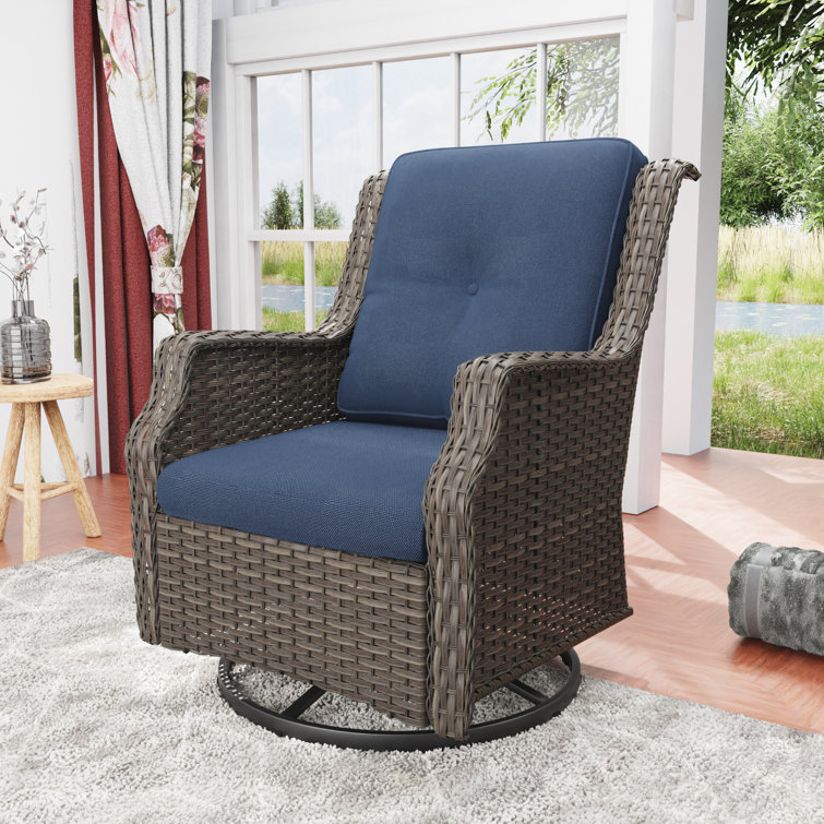 Eske Swivel Recliner Patio Chair with Cushions Corrigan Studio Color: Brown Frame/Blue Cushion