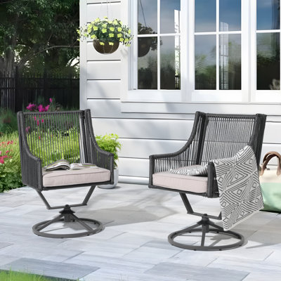 Seyhan Wicker Outdoor Dining Armchair with Cushion by Red Barrel Studio