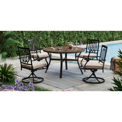 Leonard 4 - Person Patio Dining Set with Round Table , Cushions Included