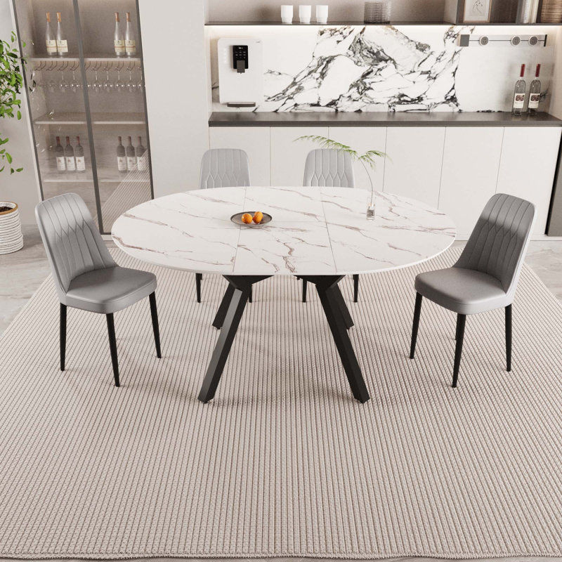 Ensemble de table de salle à manger extensible 5 pièces avec 4 chaises rembourrées, parfait pour les réunions de famille et les maisons modernes.