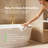 67" White Solid Surface Freestanding Bathtub With French Rolled Edge Design