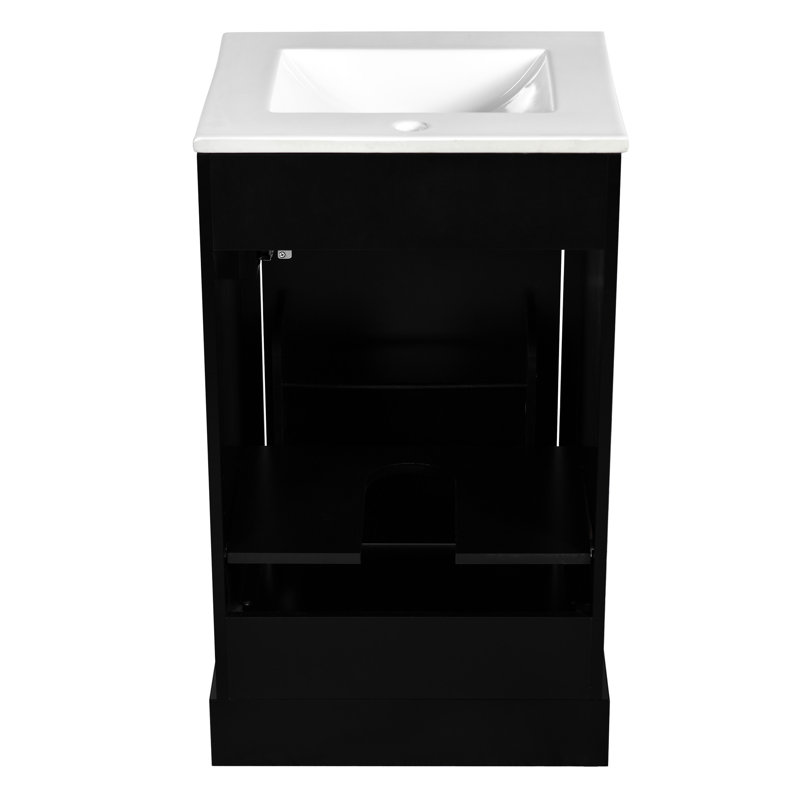 Meuble-lavabo de 20 pouces avec lavabo en céramique. Compact et élégant. Protection contre le débordement. Étagère réglable à fixation sur porte. Finition noire. Évier de construction, porte à fermeture en douceur, rangement pour un espace serein