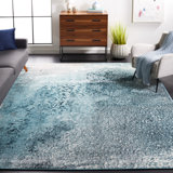 Mclawhorn Abstract Teal Area Rug