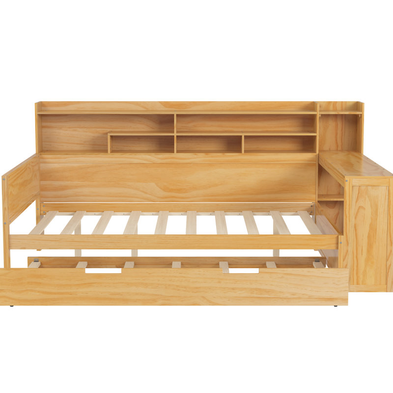 Lit de jour en bois naturel avec beaucoup de rangement, lit gigogne simple et espace d'étude productif en teintes de bois, tablettes, bureau, finition