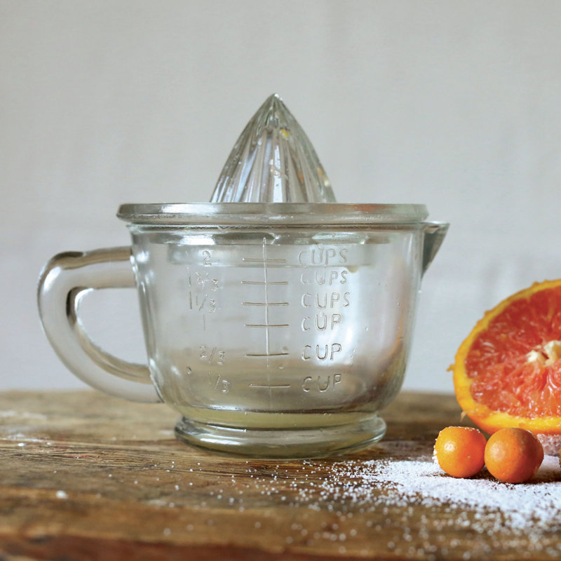 Presse-agrumes en verre pressé avec tasse à mesurer