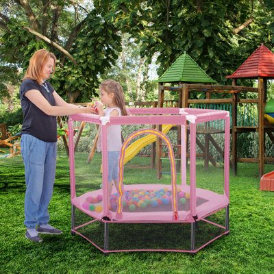 Trampoline hexagonale pour enfants avec enceinte sécuritaire