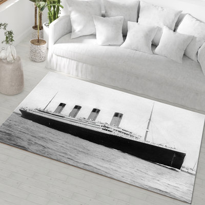 Tapis de style bohémien non tissé doux avec motifs géométriques vibrants, idéal pour une touche de décoration chic
