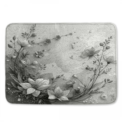 Tapis de bain monochrome à motif floral