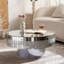 Table basse luxueuse à miroir rond pour ajouter du glamour au décor de votre salon.