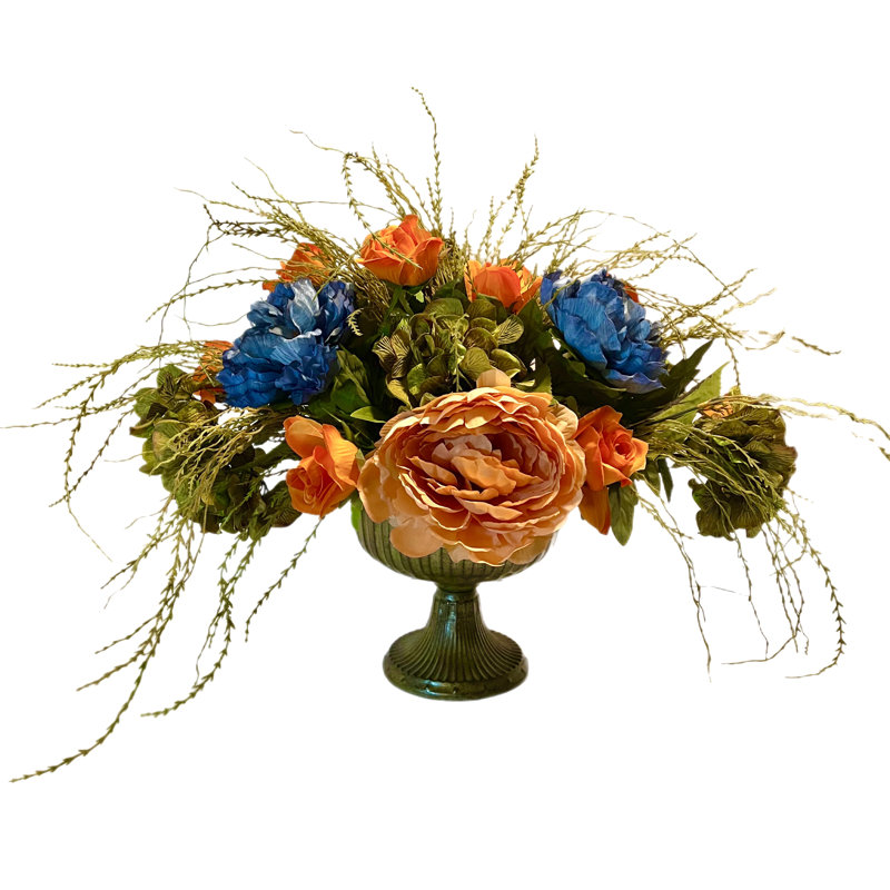 Arrangement de pivoines et d'hortensias dans un vase