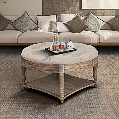 Table basse avec repose-pieds capitonné