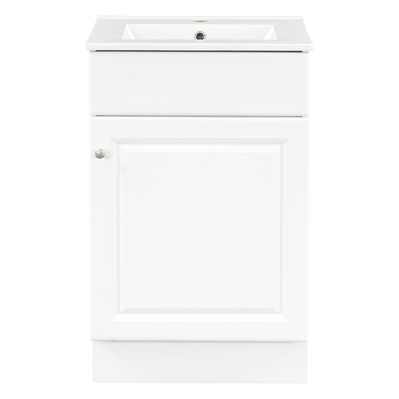 Meuble-lavabo et lavabo blancs de 20 po. Armoire avec tablette peu encombrante. Lavabo en céramique à texture lisse. Porte pour lavabo, blanc. Surface pratique facile à entretenir.