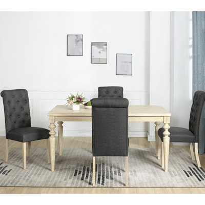 Five-piece Dining Set with Turned-Leg Dining Table and Four Tufted Chairs for a Stylish and Comfortable Dining Experience