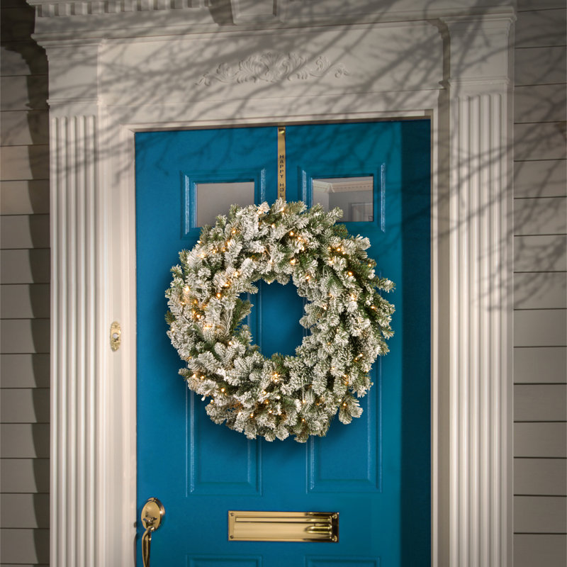 The Holiday Aisle® Snowy Sheffield Spruce Wreath with Battery Operated LED Lights, 24" H x 24" W x 5" D