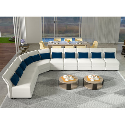 Canapé modulaire réversible en microfibre avec repose-pieds Braegan