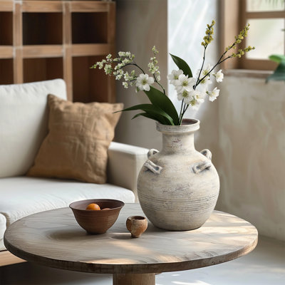Vase rustique en terre cuite texturée avec quatre poignées