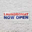 Bannière Laundromat Now Open