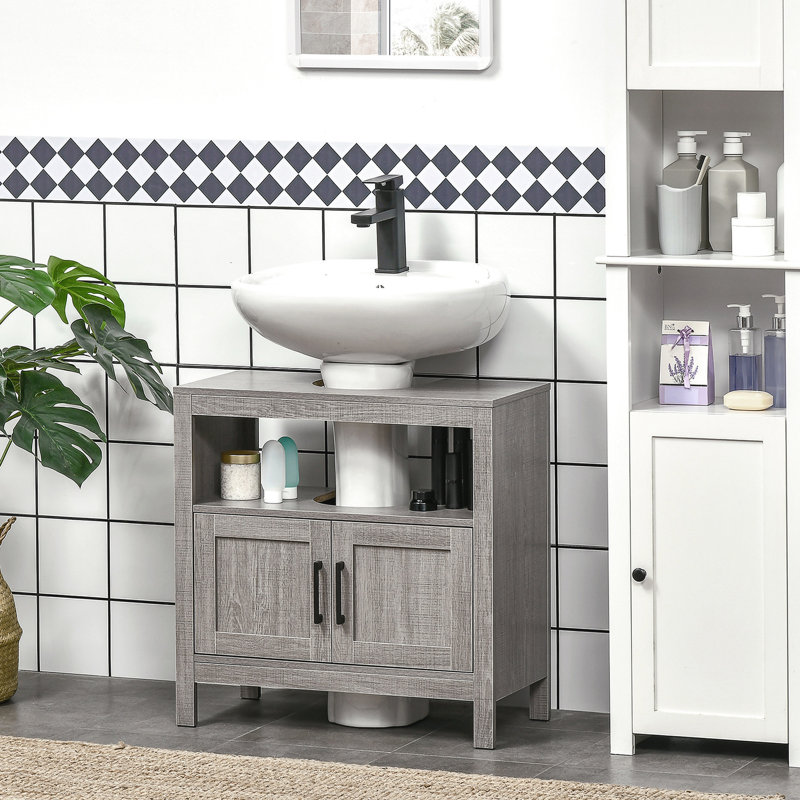 Meuble-lavabo compact avec armoire de rangement et tablette ouverte, teinte grise, peu encombrant sous l'évier