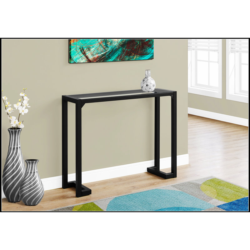Console étroite avec plateau en verre trempé transparent et structure en métal noir pour les entrées et les canapés