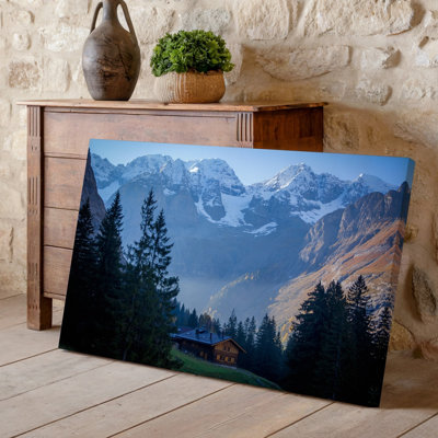 Canvas A Serene Mountain Landscape Featuring Towering Snow Capped Peaks In Wall Art The Background Partially Shrouded In Mist Creating Canvas Wall Art